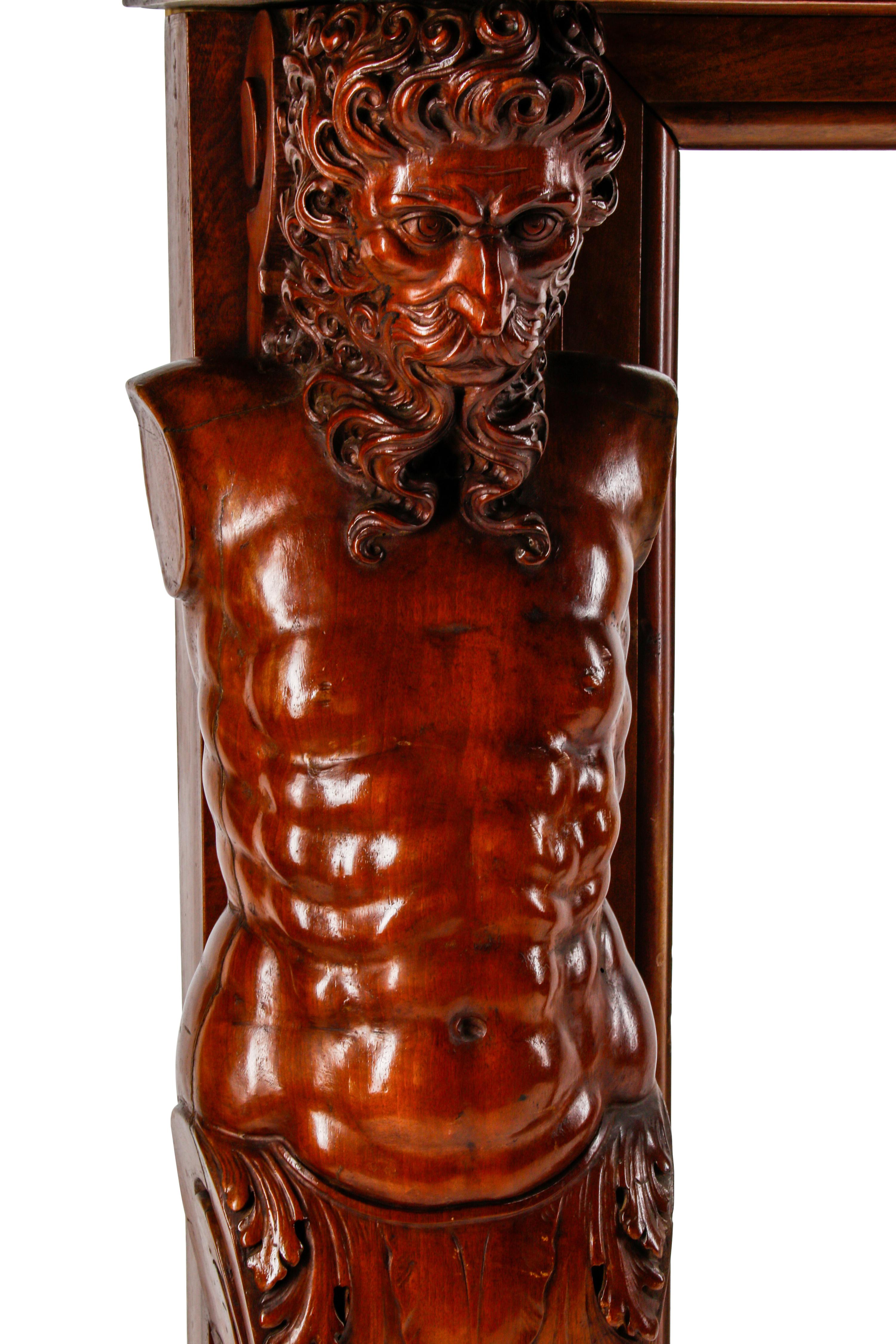 A Renaissance Revival Carved Walnut Chimneypiece