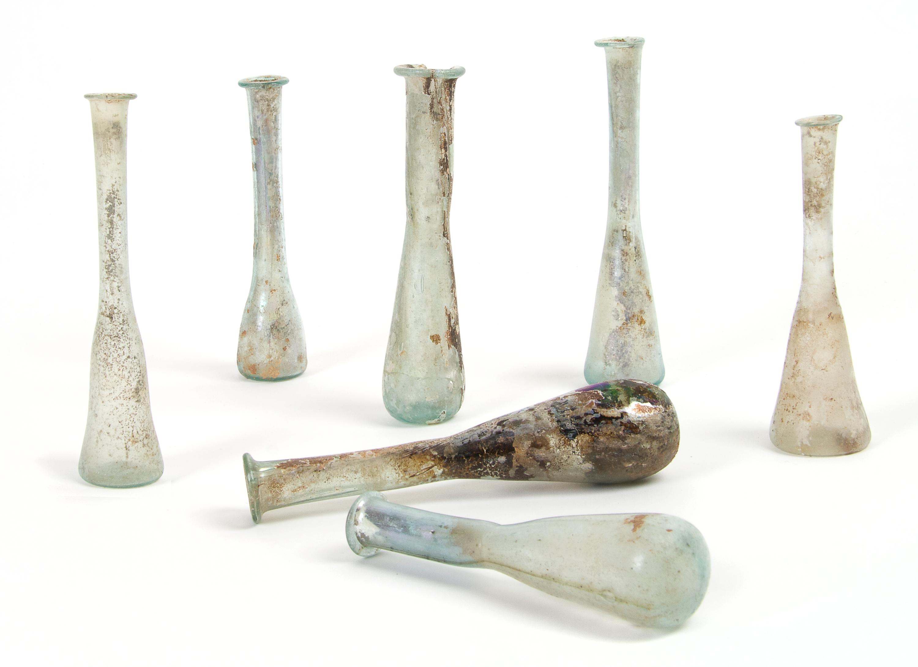 A Collection of Seven Roman Glass Unguentariums, Height of tallest 5 inches.