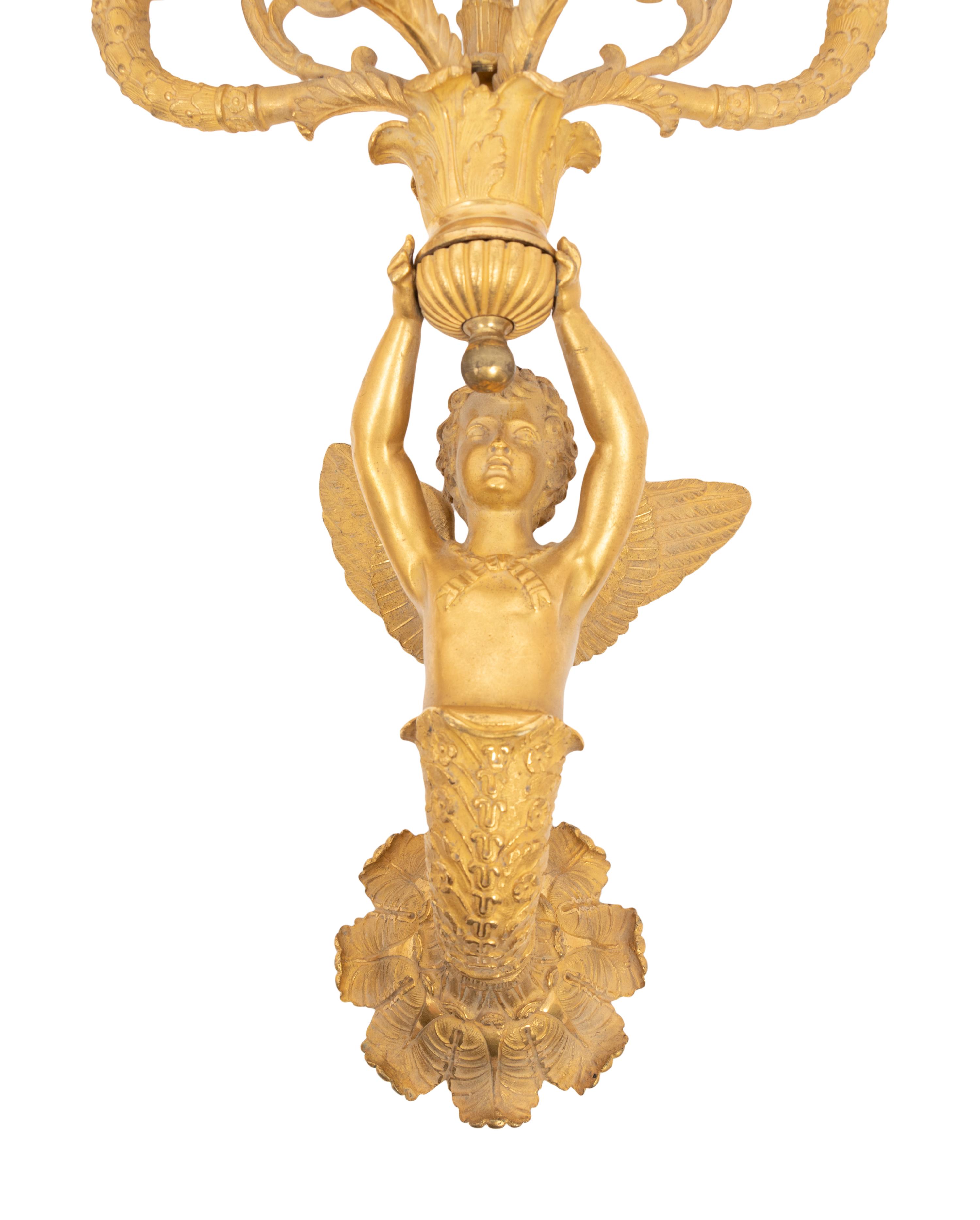 A Pair of Empire Gilt Bronze Five-Light Wall Lights