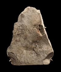 An Egyptian Limestone Ostracon with a Female Musician and Singing Goose