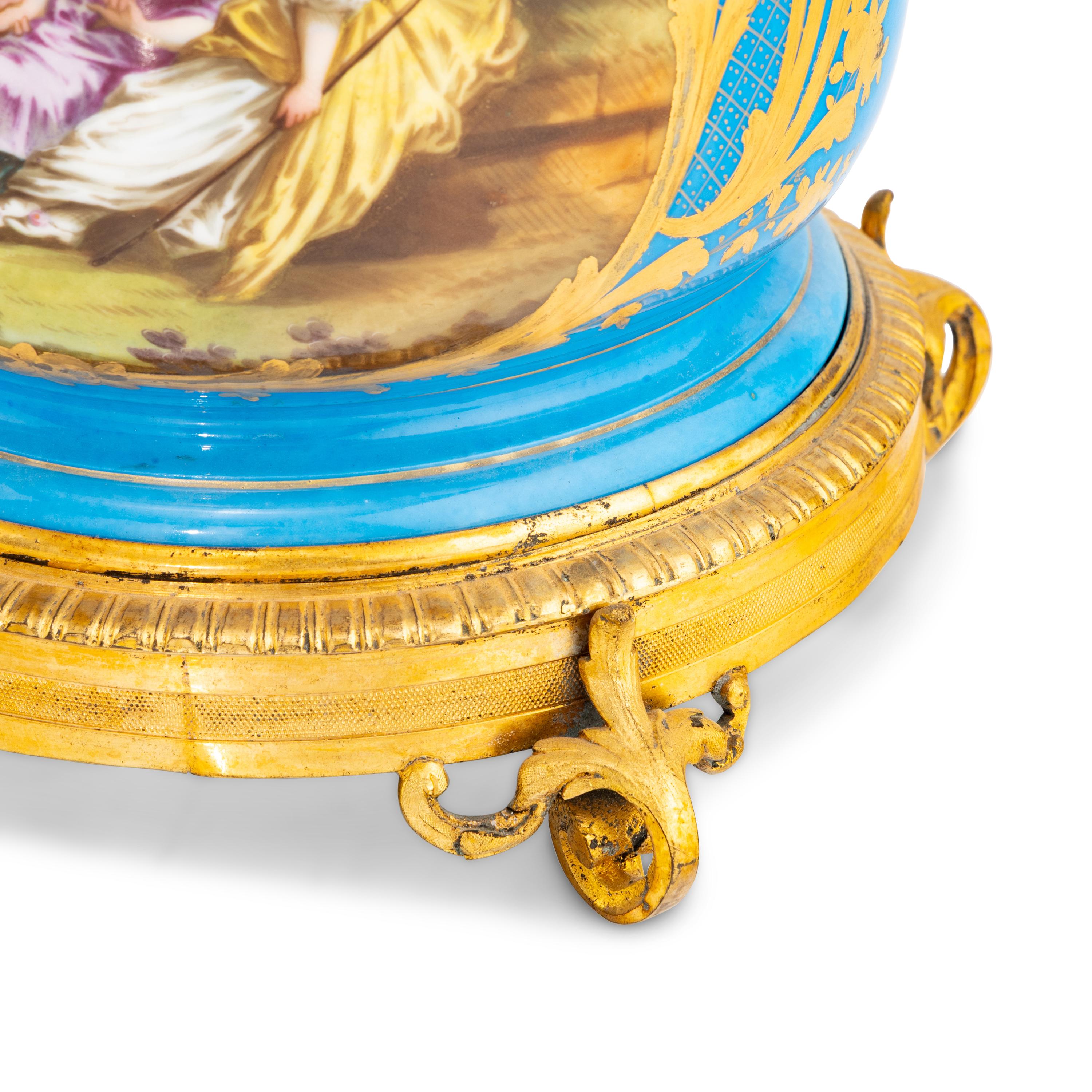 A Pair of Sèvres Style Porcelain and Gilt Bronze Mounted Cache Pots