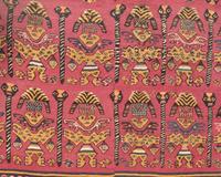 A Chimu Unku Textile with Warriors Carrying Heads