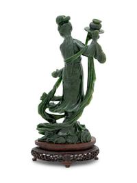 A Large Chinese Spinach Jade Figure of a Female Immortal