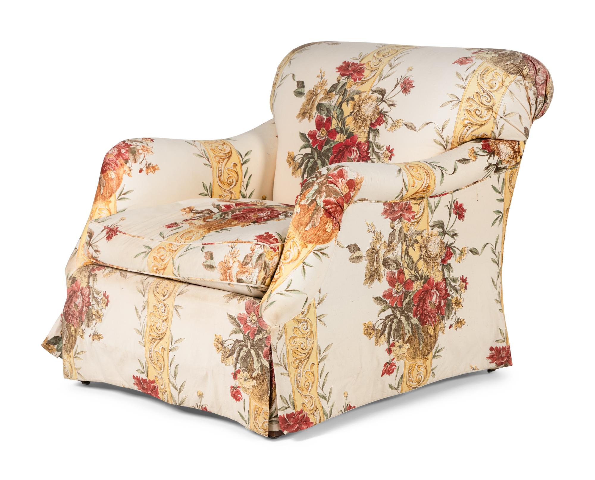 A Pair of Printed Cotton Upholstered Lounge Chairs with Ottoman