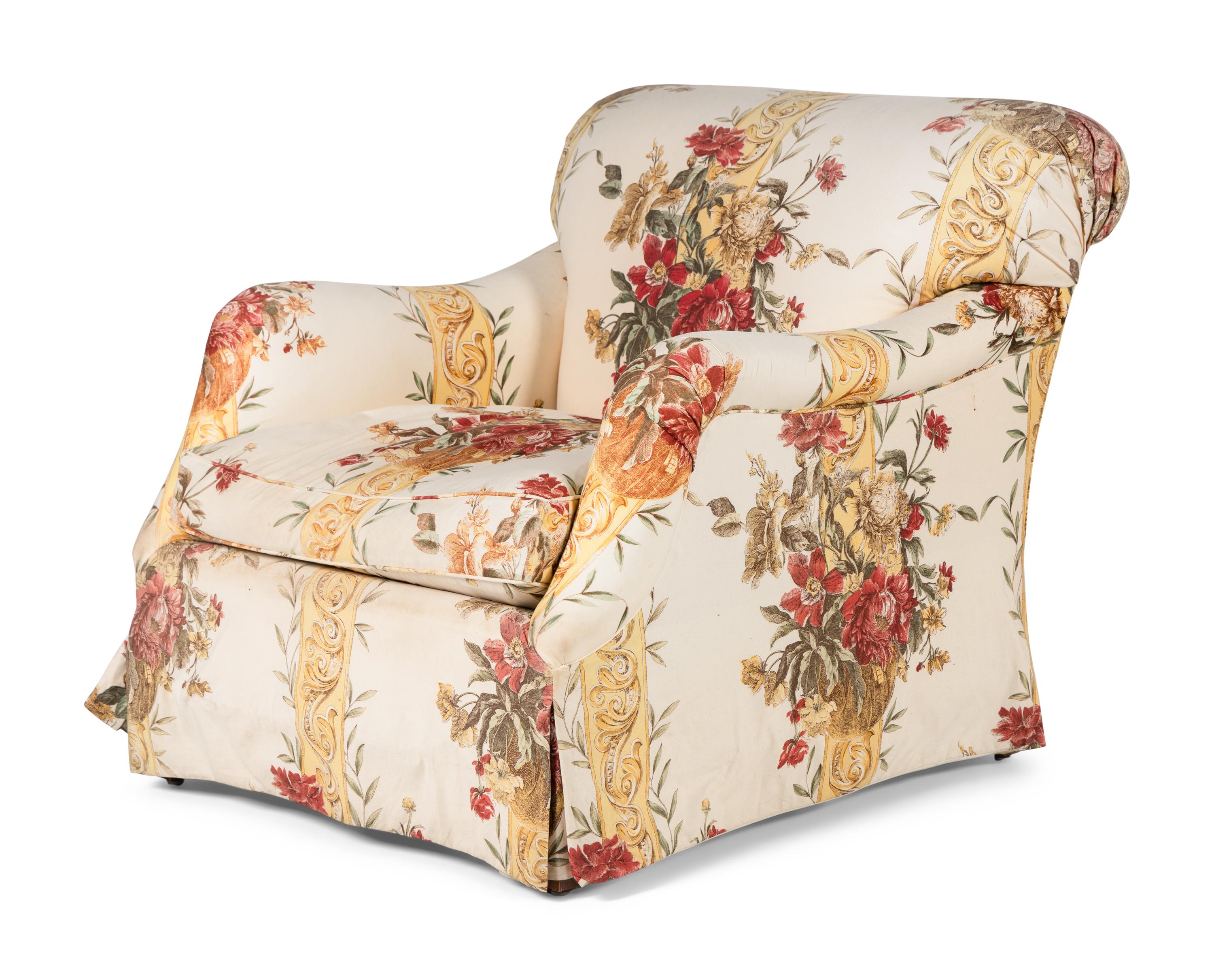 A Pair of Printed Cotton Upholstered Lounge Chairs with Ottoman
