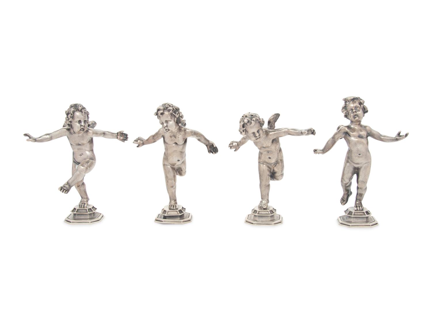 A Set of Four Buccellati Silver Putti Figures