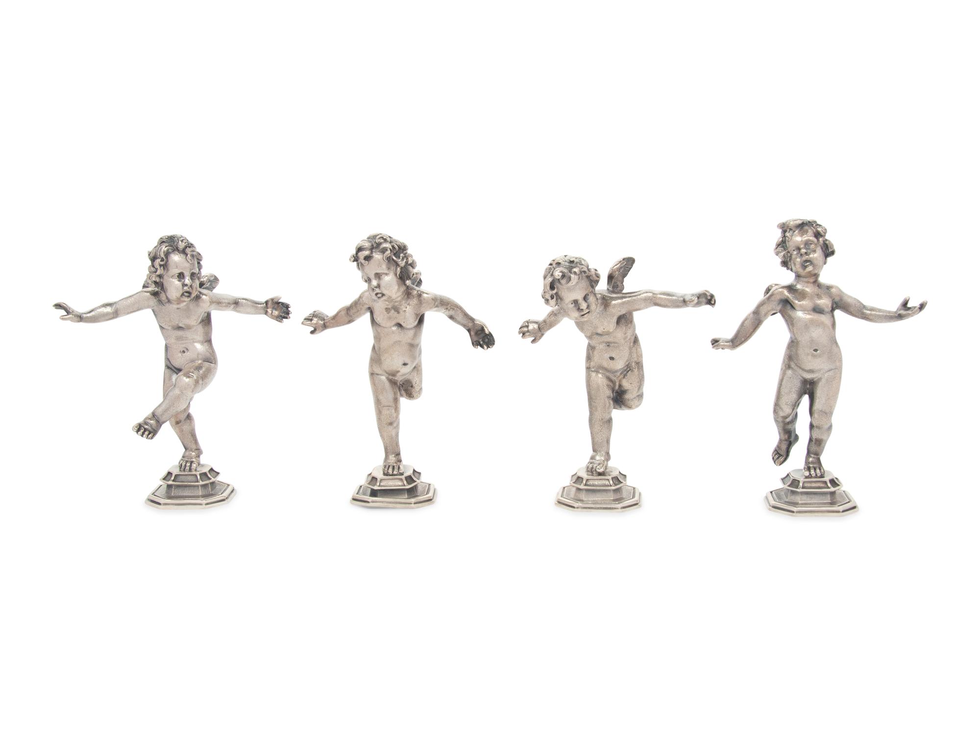 A Set of Four Buccellati Silver Putti Figures