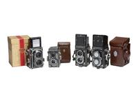 [CAMERAS]. 4 Twin Lens Reflex cameras with related material, incl. two Rolleiflex cameras.
