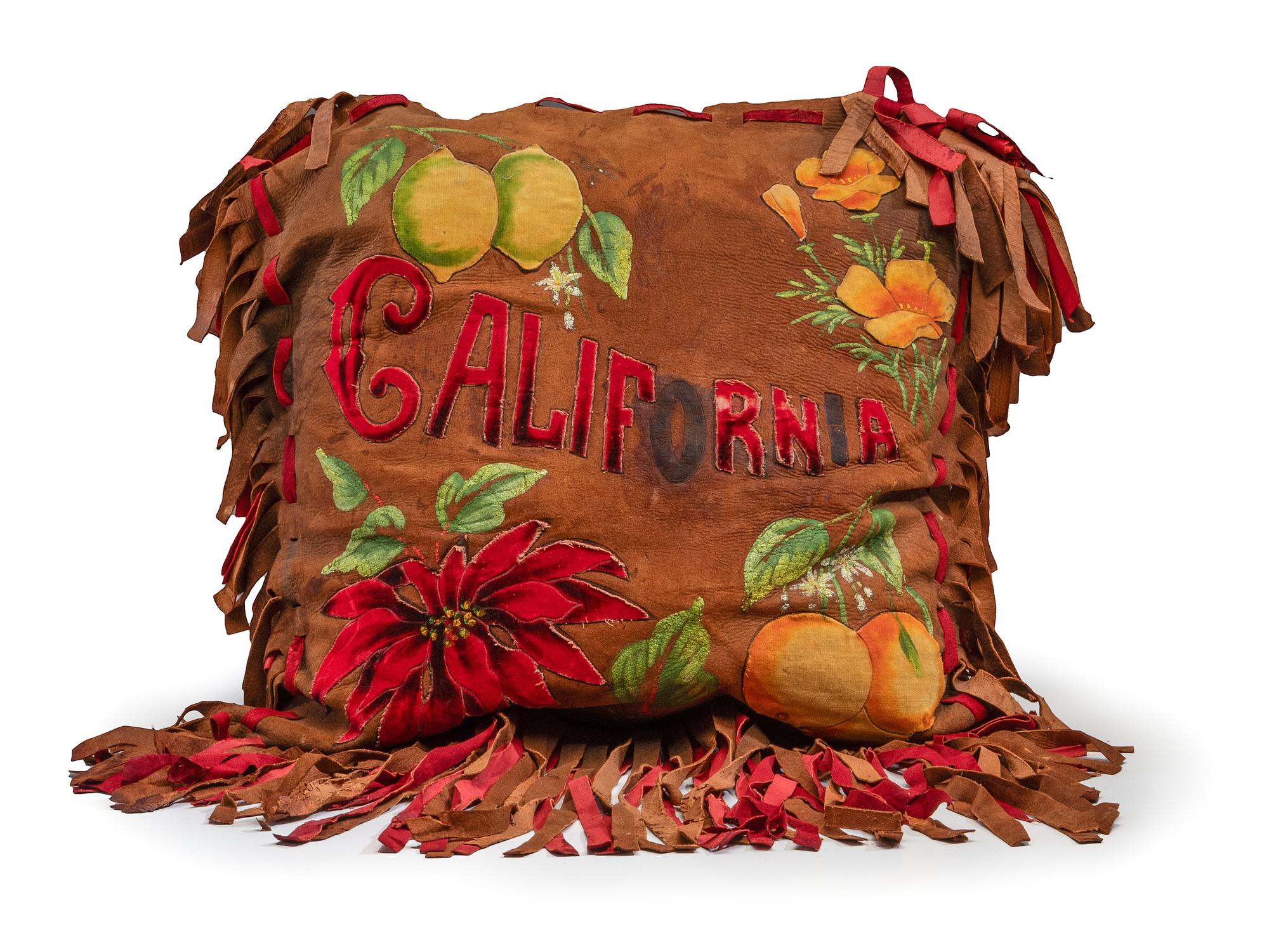 A Pair of California Arts and Crafts Painted and Appliqued Leather Pillows