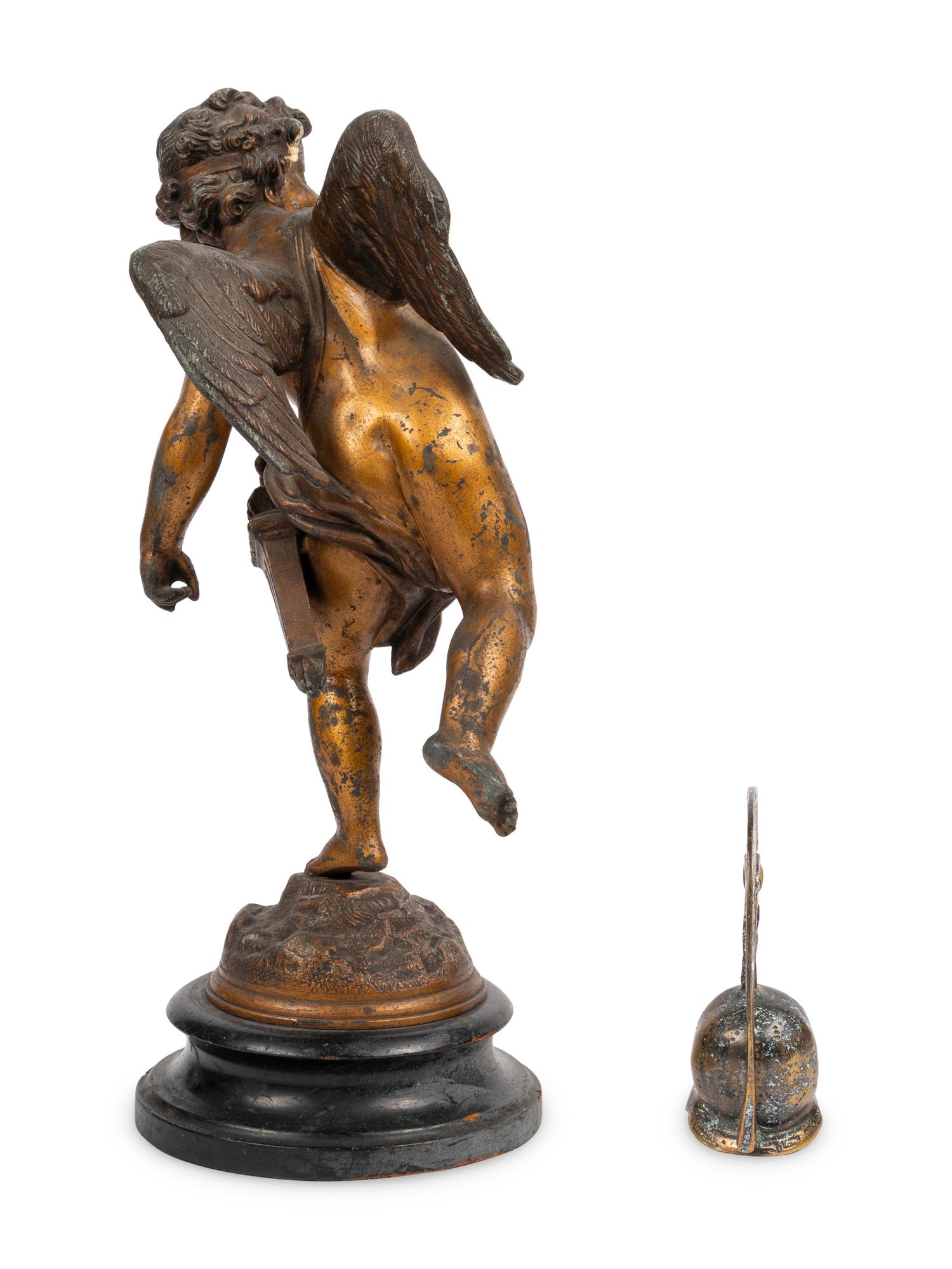 A Continental Gilt Metal Figure of Cupid