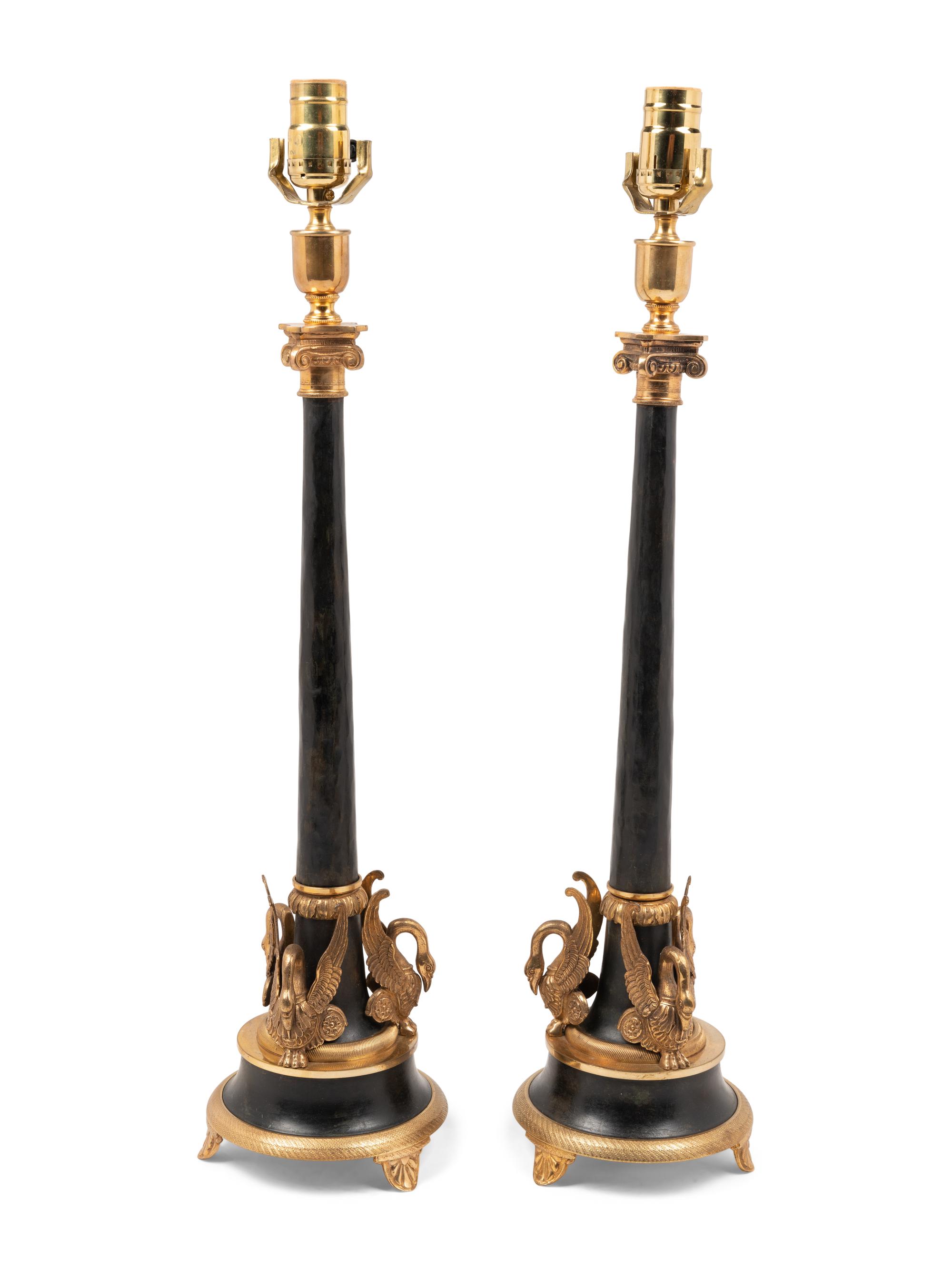 A Pair of Empire Style Gilt Metal Mounted Lamps