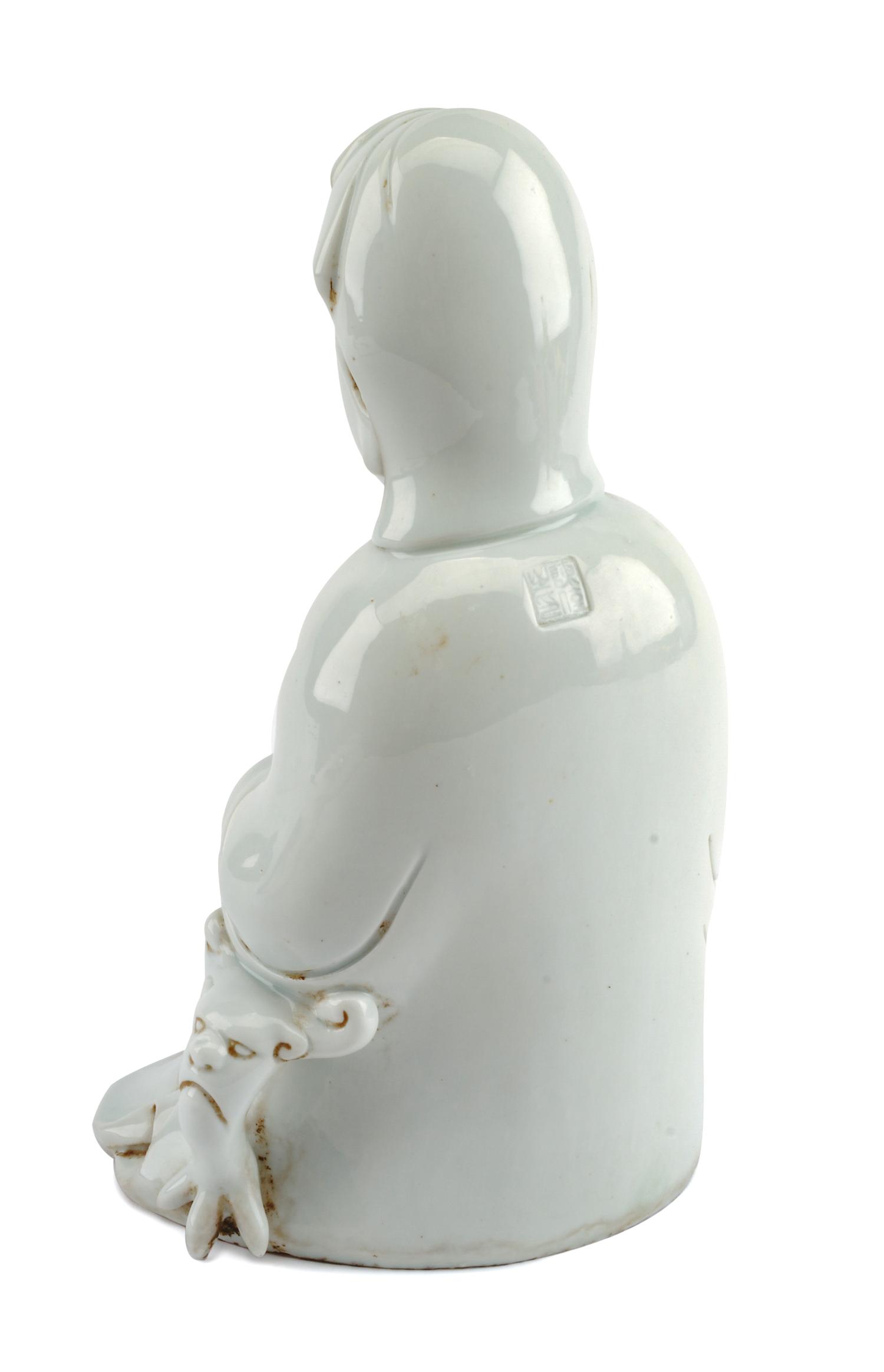 A Chinese Blanc-de-Chine Porcelain Figure Height 10 inches.