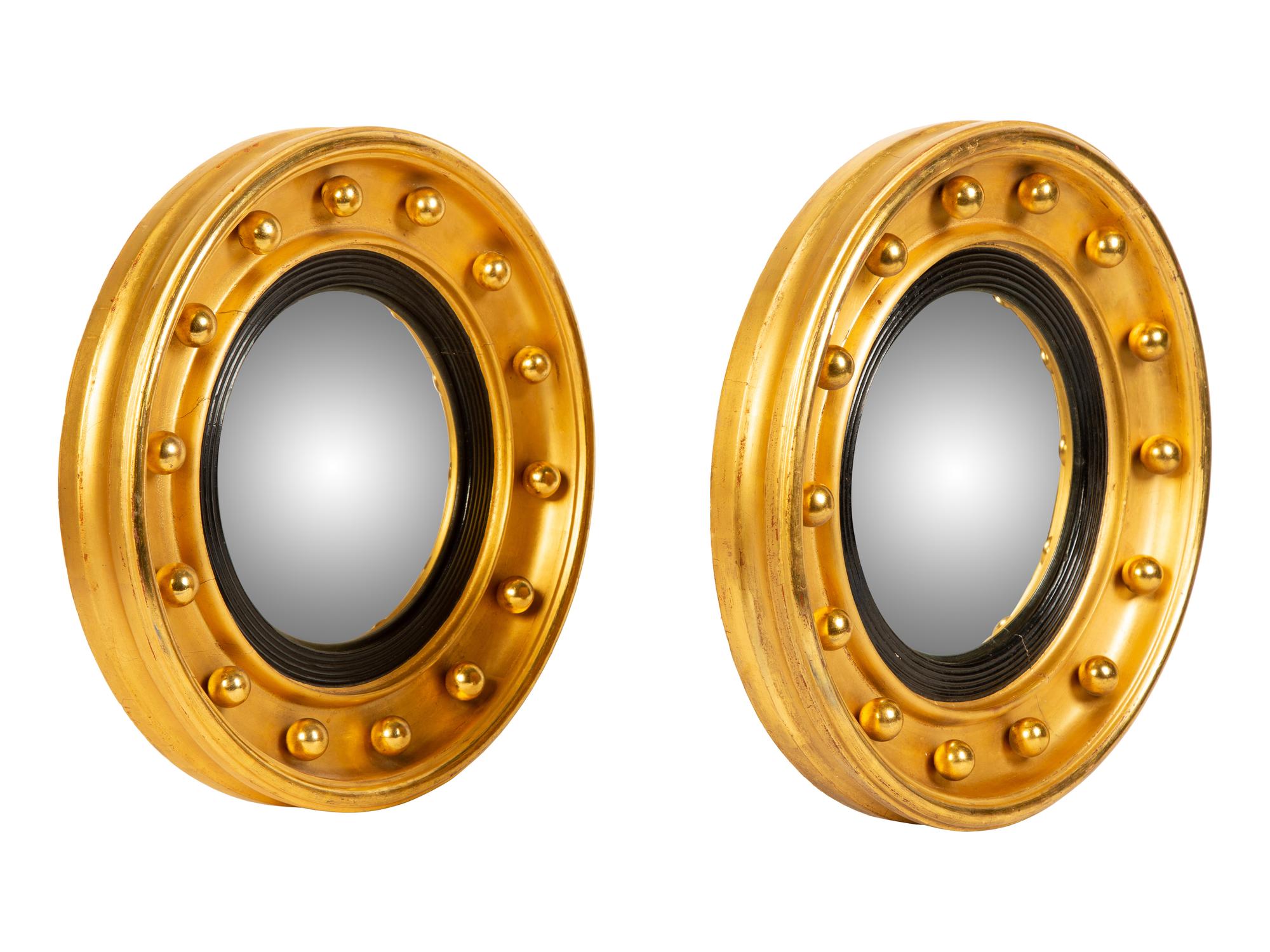 A Pair of English Gilt Framed Bull's Eye Mirrors — 19TH CENTURY