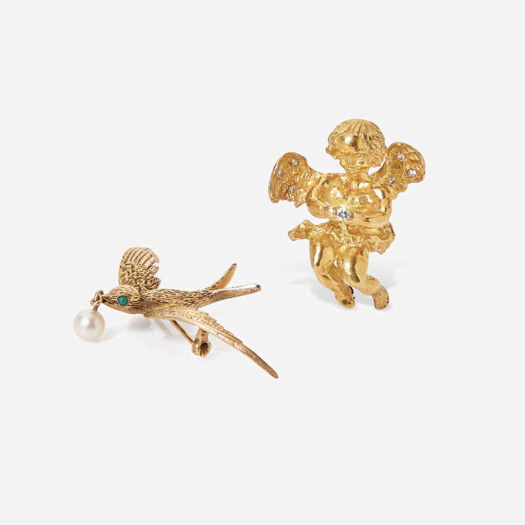 A Collection of Two Yellow Gold and Gemstone Pins