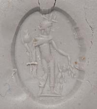 A Roman Carnelian Ring Stone with the God Mercury and the Infant Dionysus