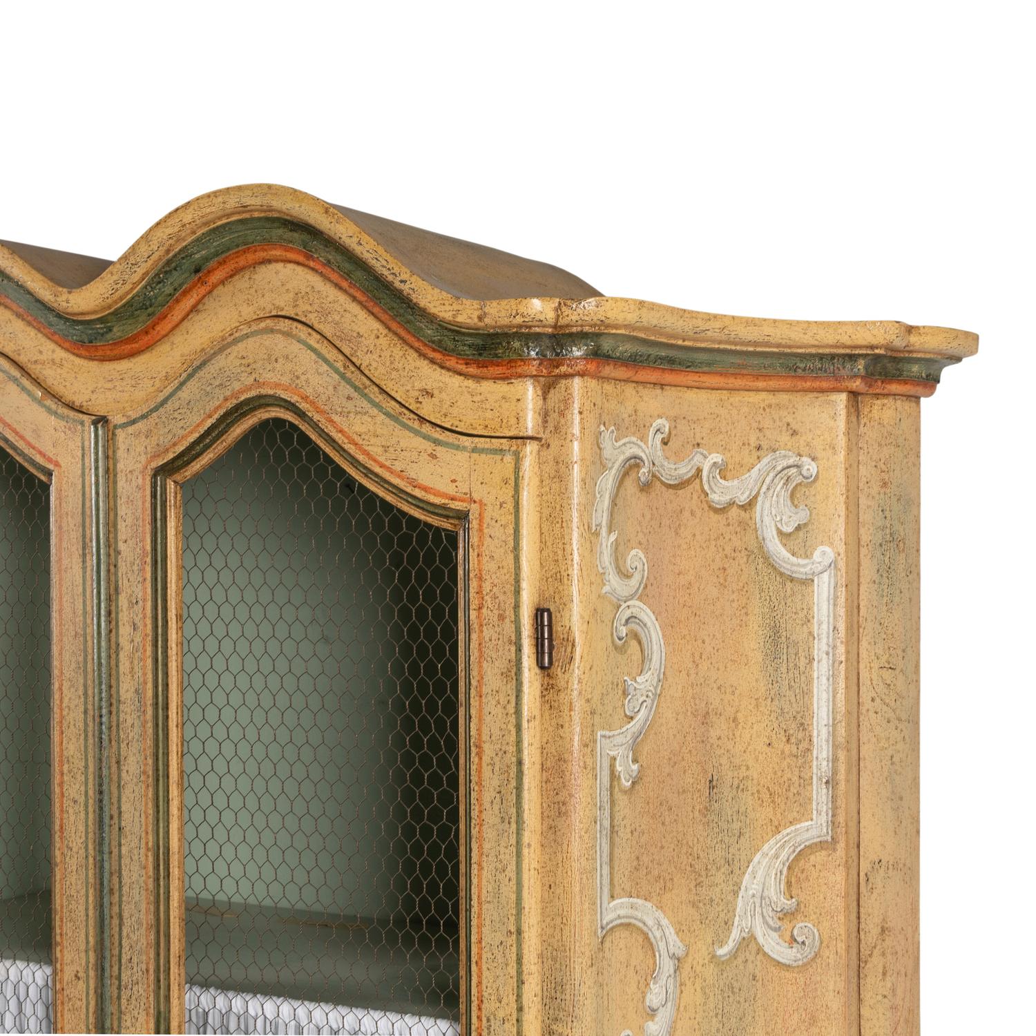 A Pair of Venetian Style Polychrome Painted Bookcases