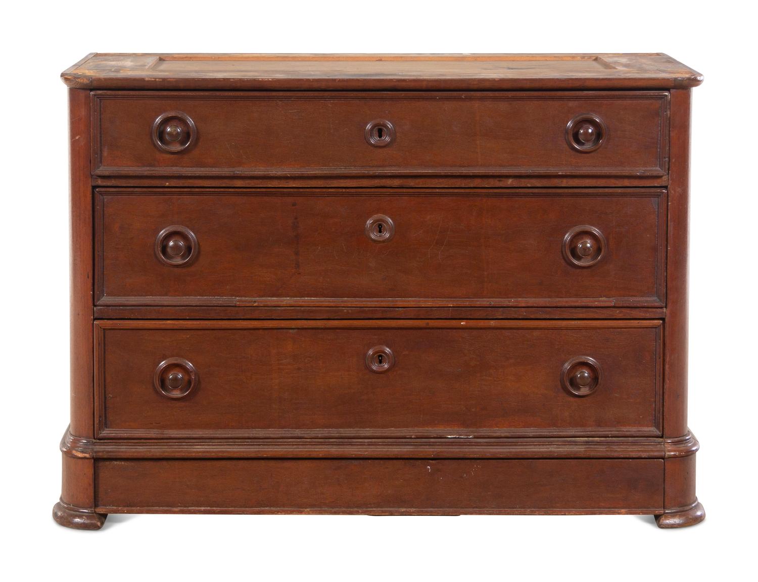 A Classical Mahogany Three-Drawer Commode