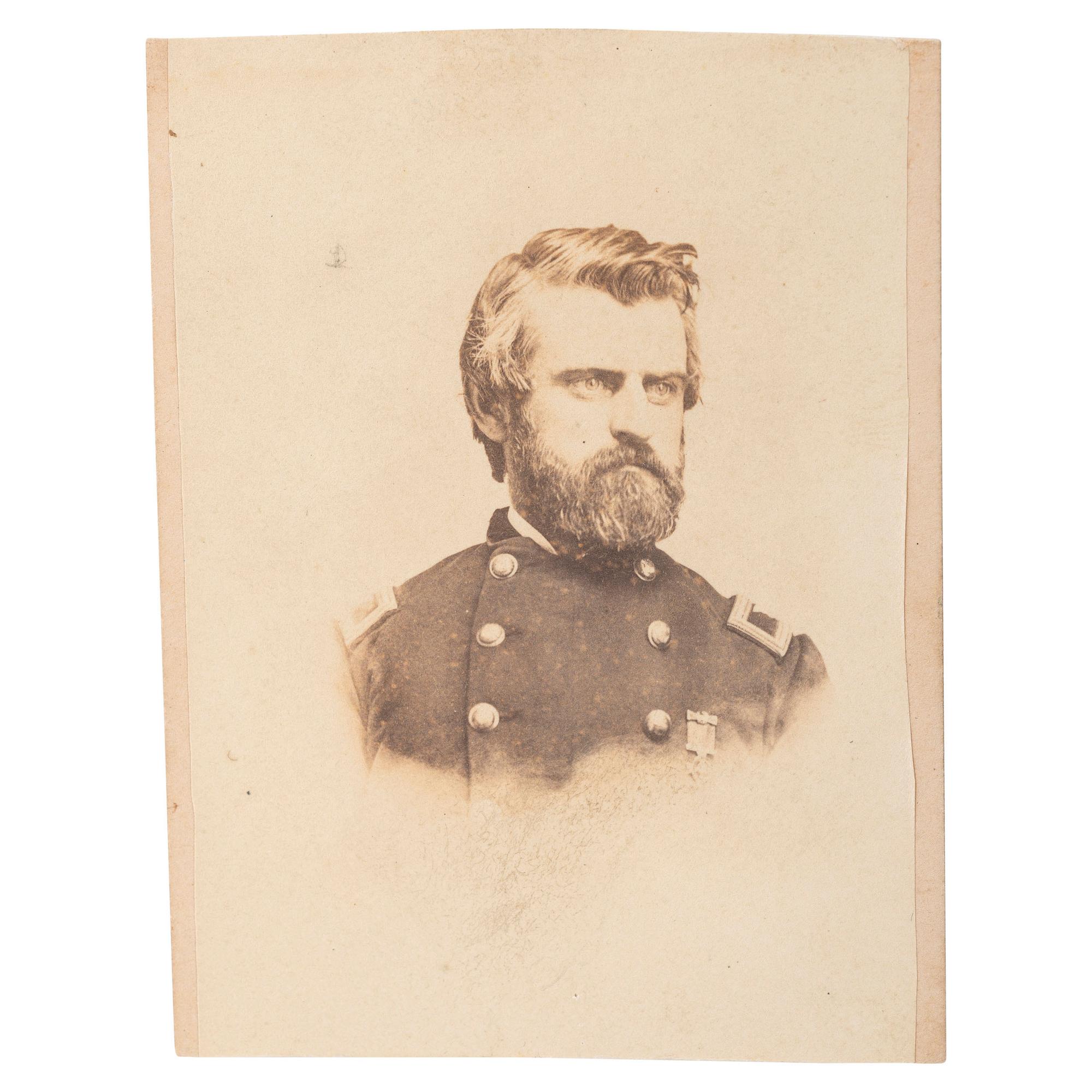 Inscribed Colt Model 1849 Pocket Revolver of Capt. James C. Strong of 21st NY - Wounded at Williamsburg - with some of his letters, published works, and CDV