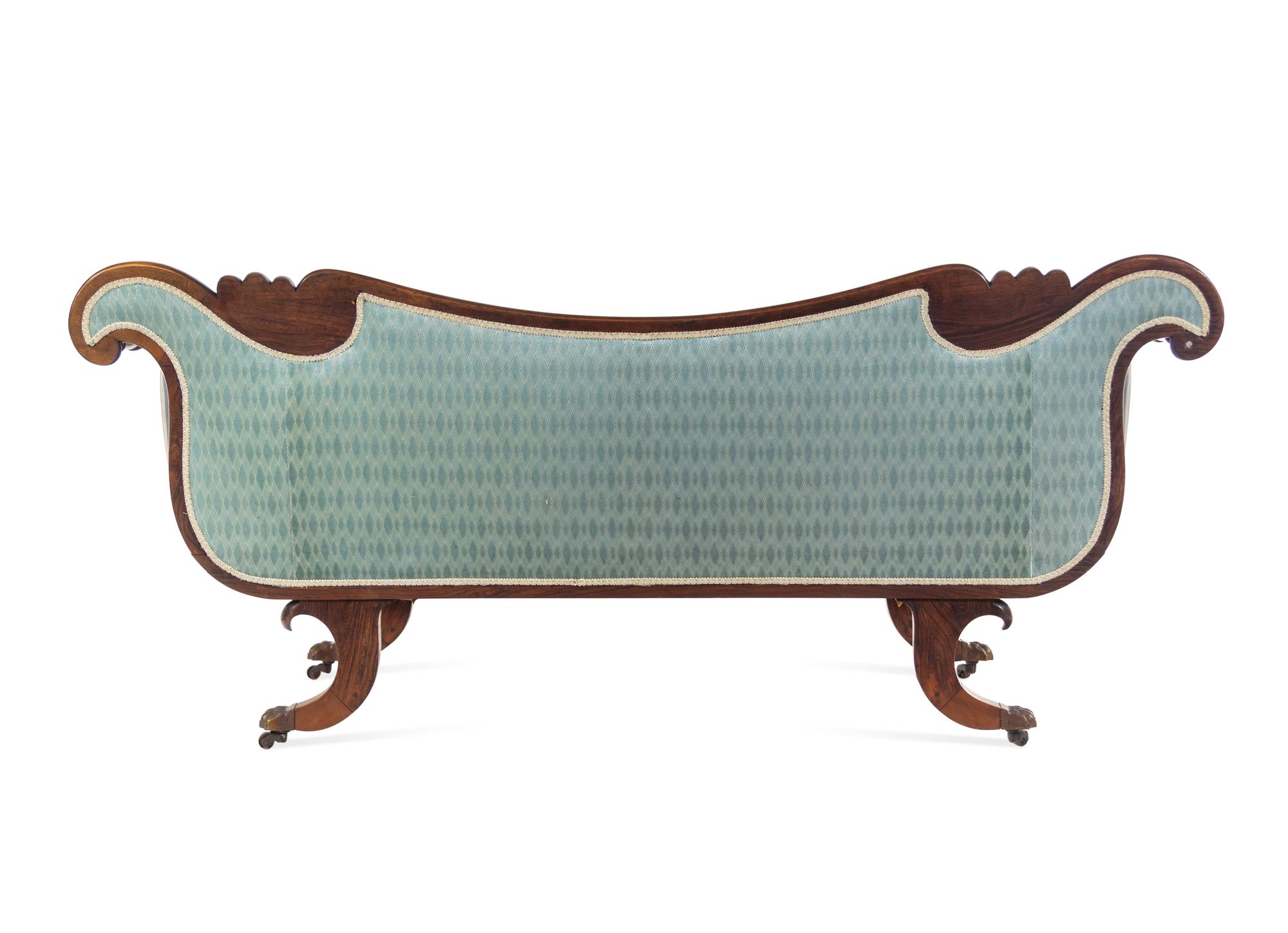 A George IV Brass Mounted Carved and Figured Mahogany Sofa