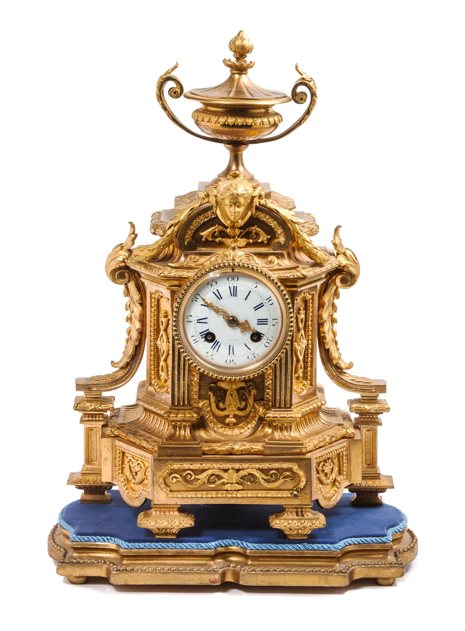 A Continental Gilt Bronze Clock Height 18 1/2 inches.
