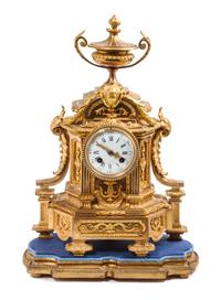 A Continental Gilt Bronze Clock Height 18 1/2 inches.