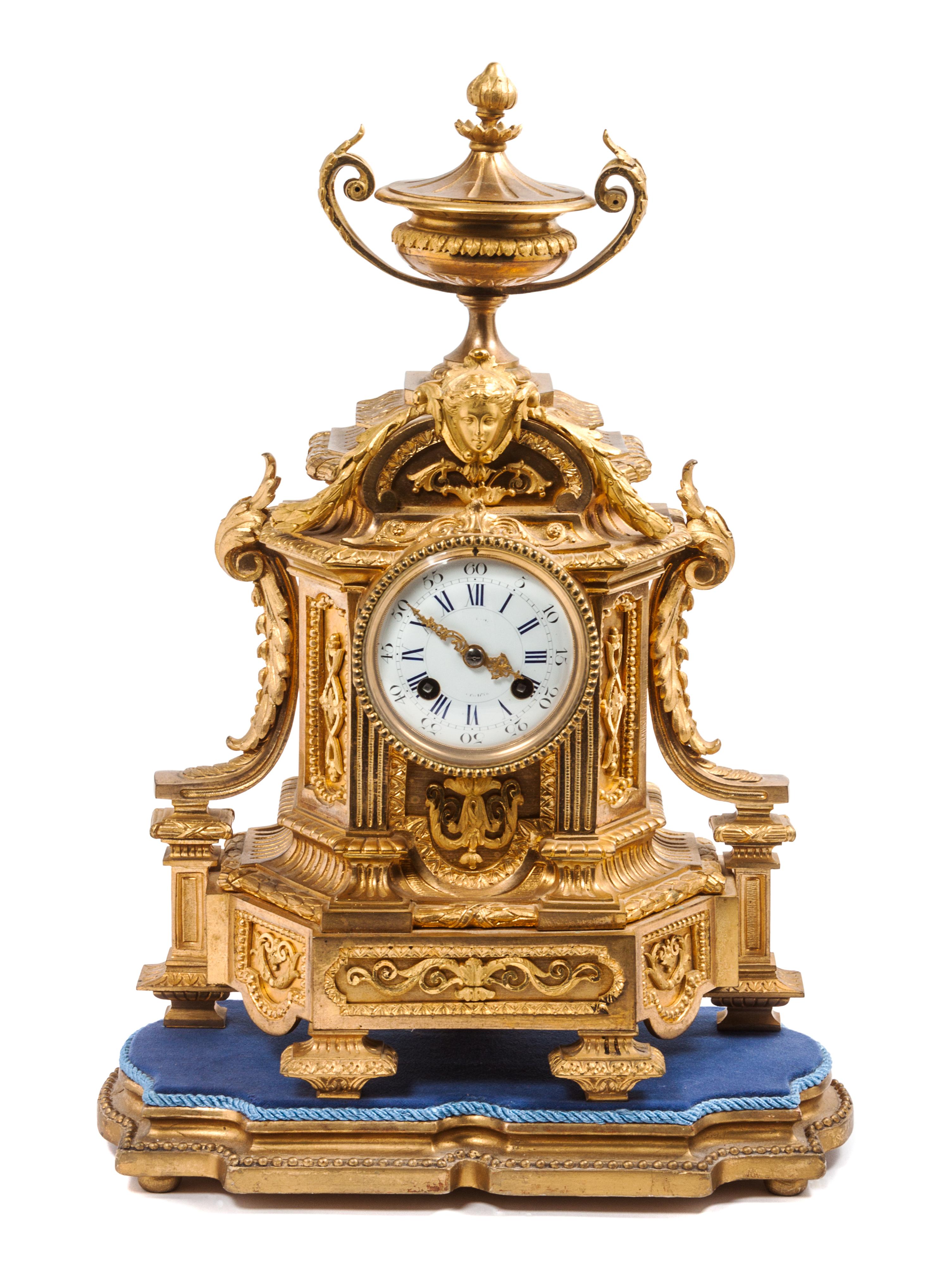 A Continental Gilt Bronze Clock Height 18 1/2 inches.