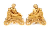 A Pair of French Gilt Bronze Figural Chenets Width 12 1/4 inches. — 19TH CENTURY