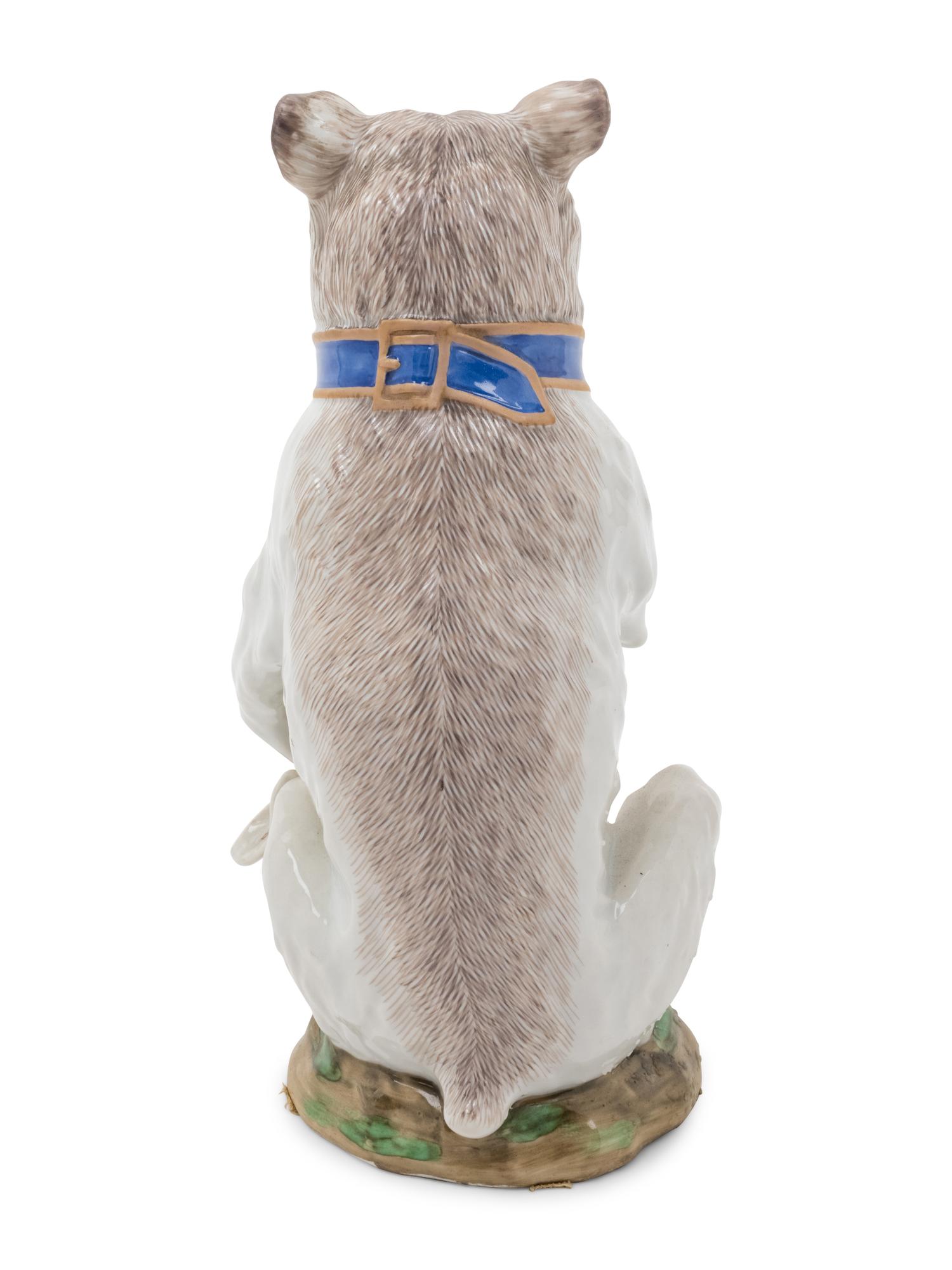 A Korzec Porcelain Dog Figure