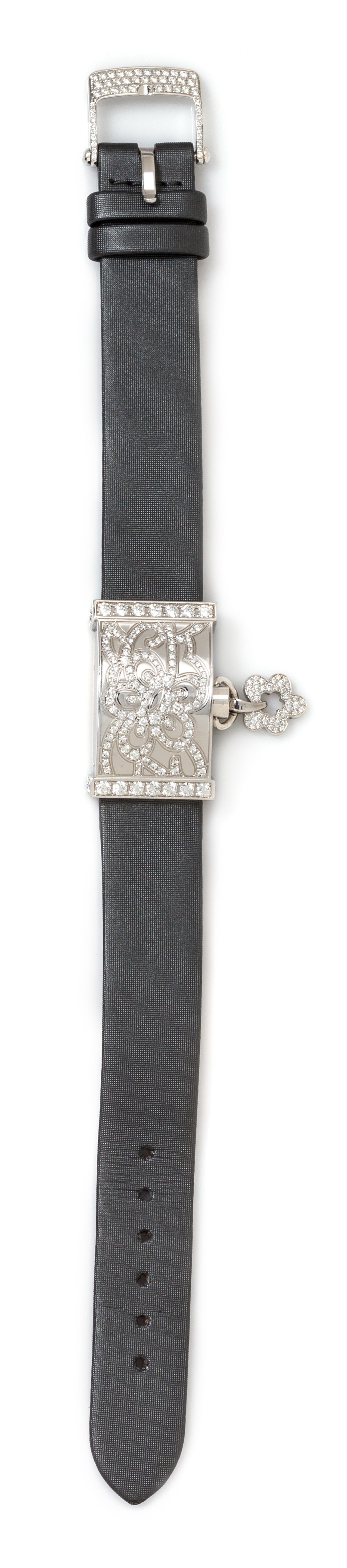 An 18 Karat White Gold, Diamond and Mother-of-Pearl Concealed 'Secret Dentelle' Wristwatch, Van Cleef & Arpels, Circa 2005,