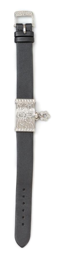 An 18 Karat White Gold, Diamond and Mother-of-Pearl Concealed 'Secret Dentelle' Wristwatch, Van Cleef & Arpels, Circa 2005,
