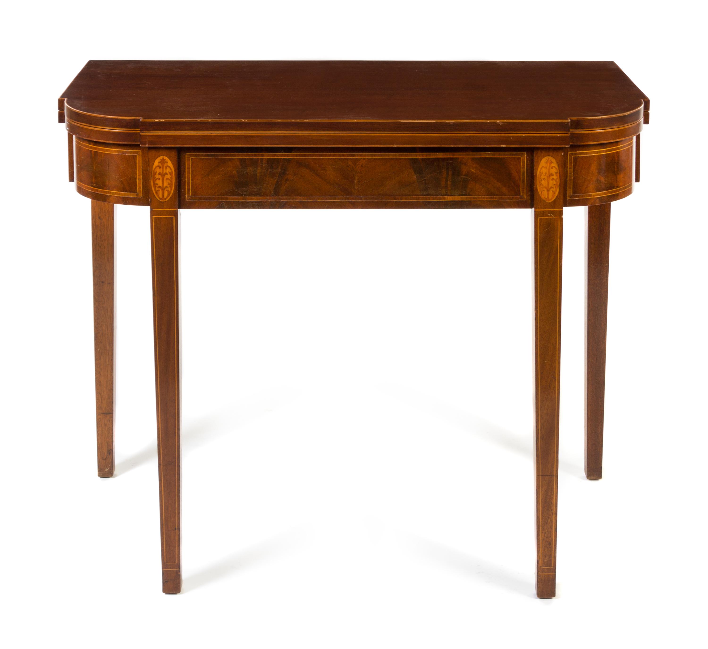 A Federal Style Fruitwood Inlaid Mahogany Flip Top Games Table Height 31 x width 38 inches.