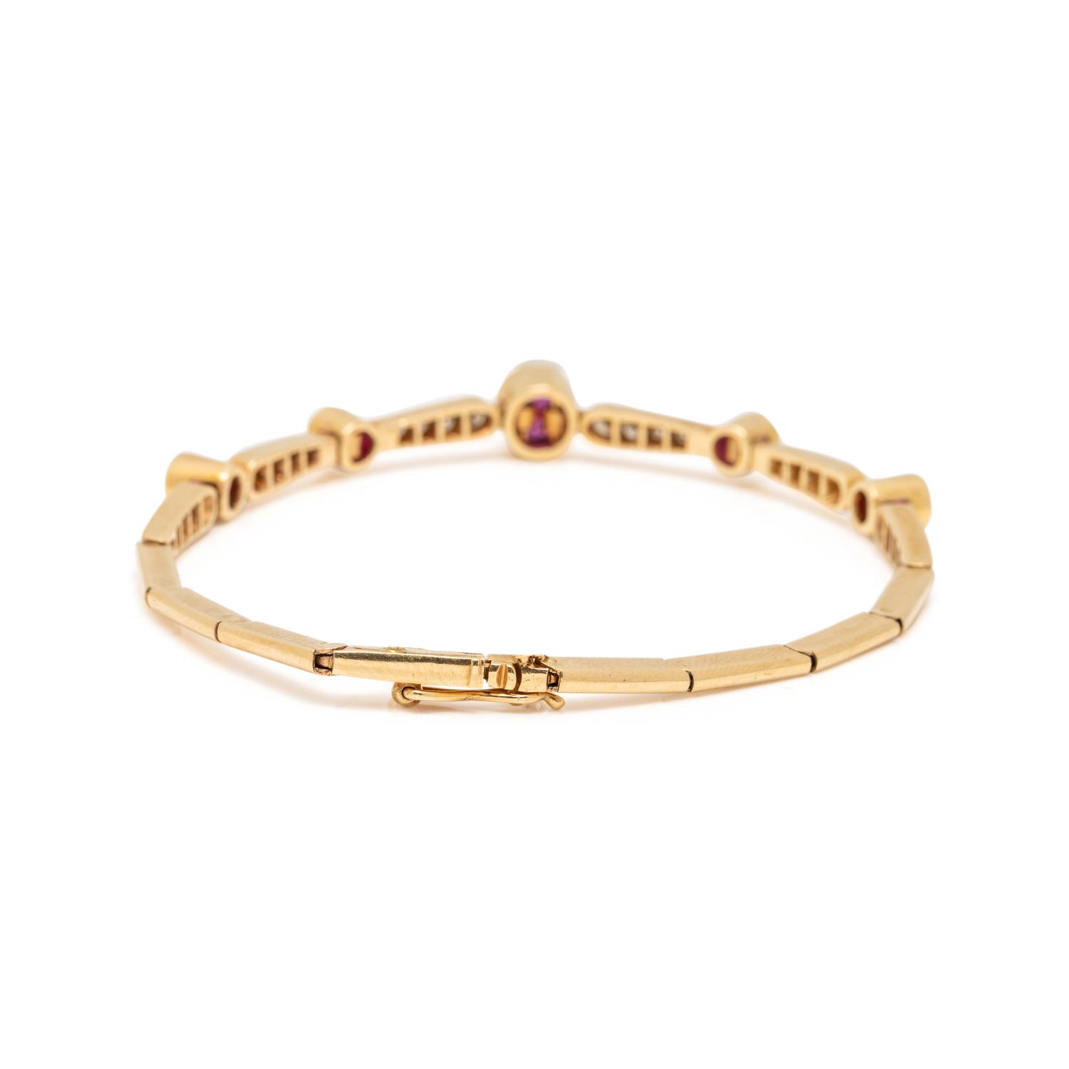 YELLOW GOLD, SYNTHETIC RUBY, AND DIAMOND BRACELET