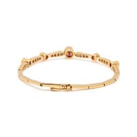 YELLOW GOLD, SYNTHETIC RUBY, AND DIAMOND BRACELET