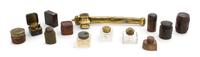 A Collection of Twelve Traveling Inkwells, Width of widest 9 1/2 inches.