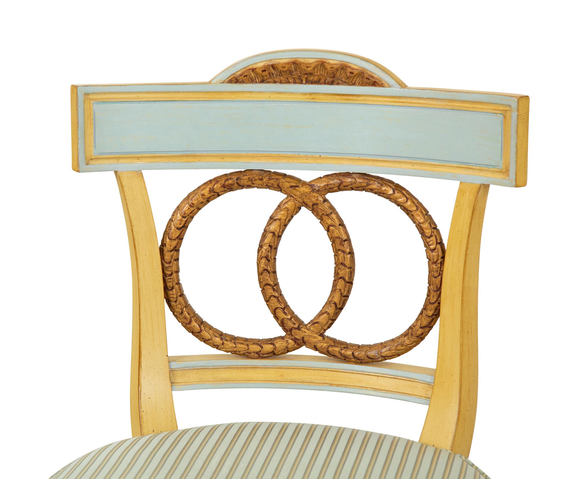 Eight Neoclassical Style Painted and Parcel Gilt Dining Chairs