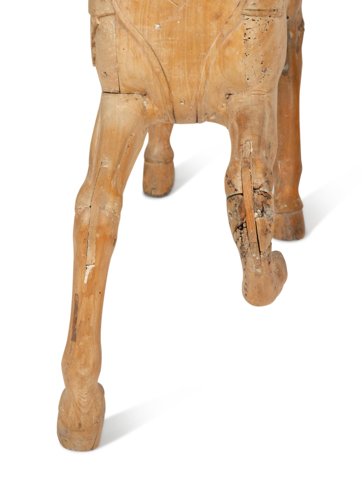 A Pair of Italian Carved Wood Carousel Horses in the Manner of Gustav Dentzel