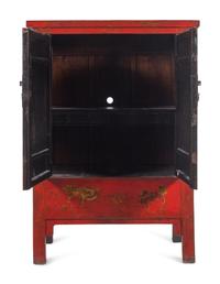 A Chinese Export Red Lacquer Cabinet with Gilt Decoration