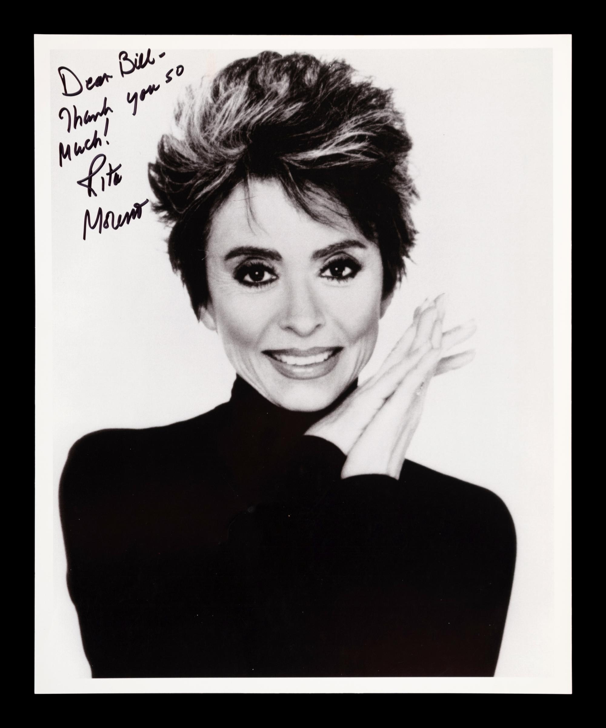 (Celebrity) A group of 20 autographed photographs of celebrities, comprising: