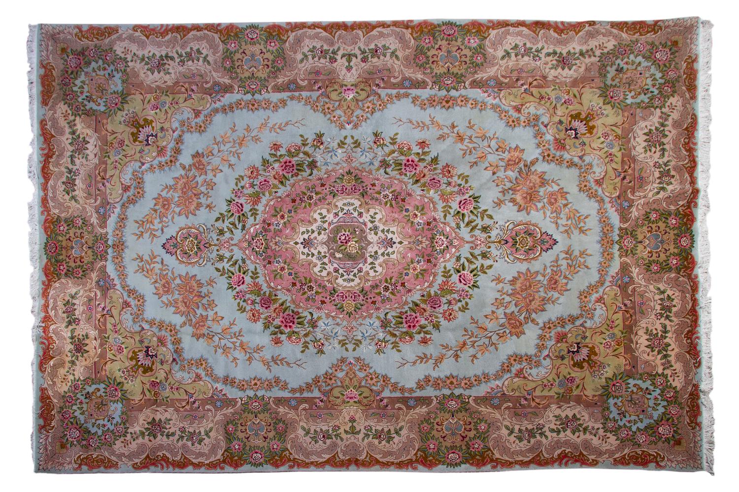 A Tabriz Silk and Wool Rug, 11 feet 1 inch x 7 feet 9 inches.