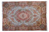 A Tabriz Silk and Wool Rug, 11 feet 1 inch x 7 feet 9 inches.
