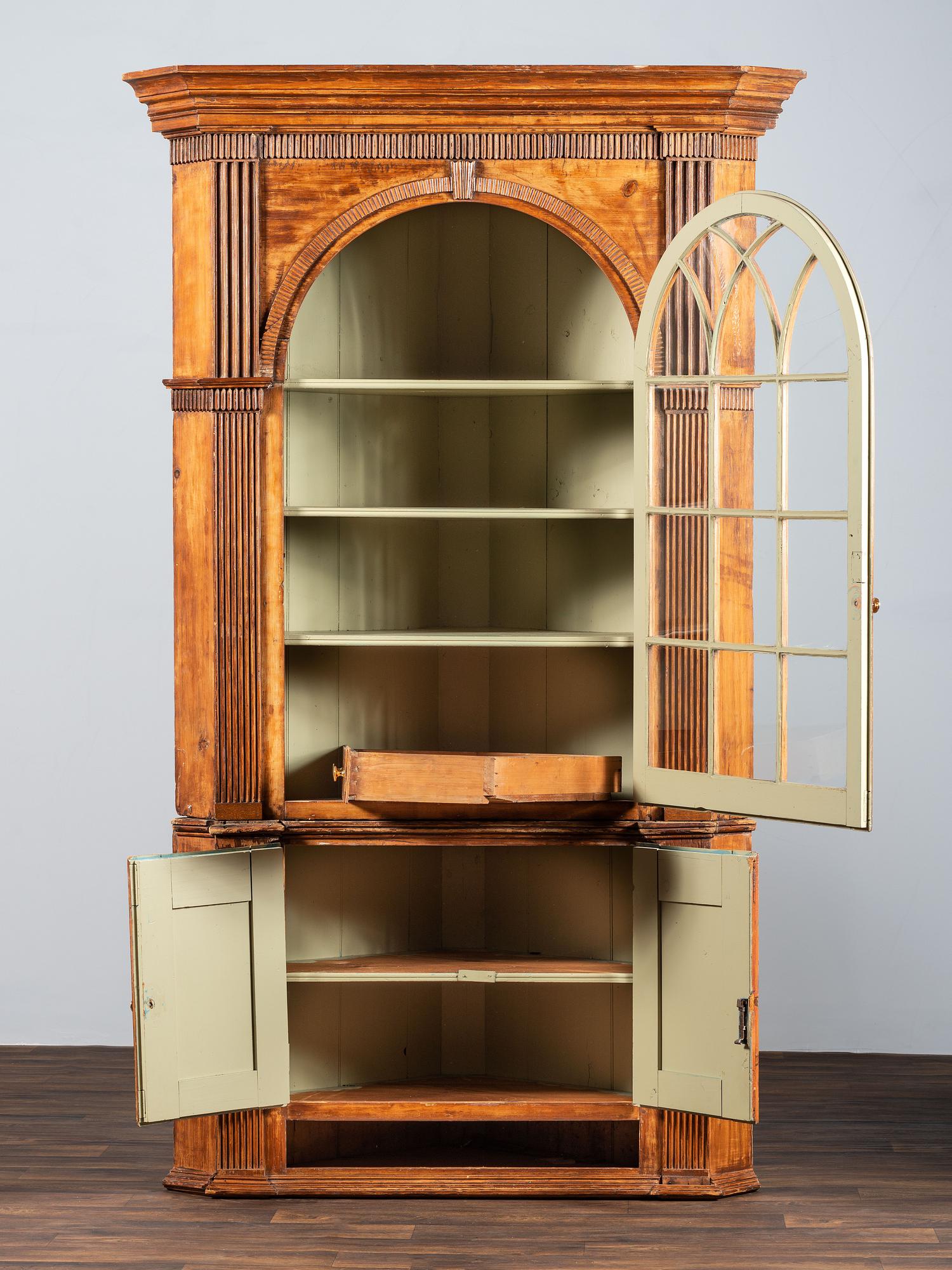 A Chippendale Carved and Stained Pine Corner Cupboard