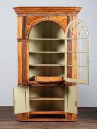 A Chippendale Carved and Stained Pine Corner Cupboard