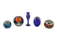 A Group of Four Art Glass Paper Weights and a Bud Vase — 20TH CENTURY