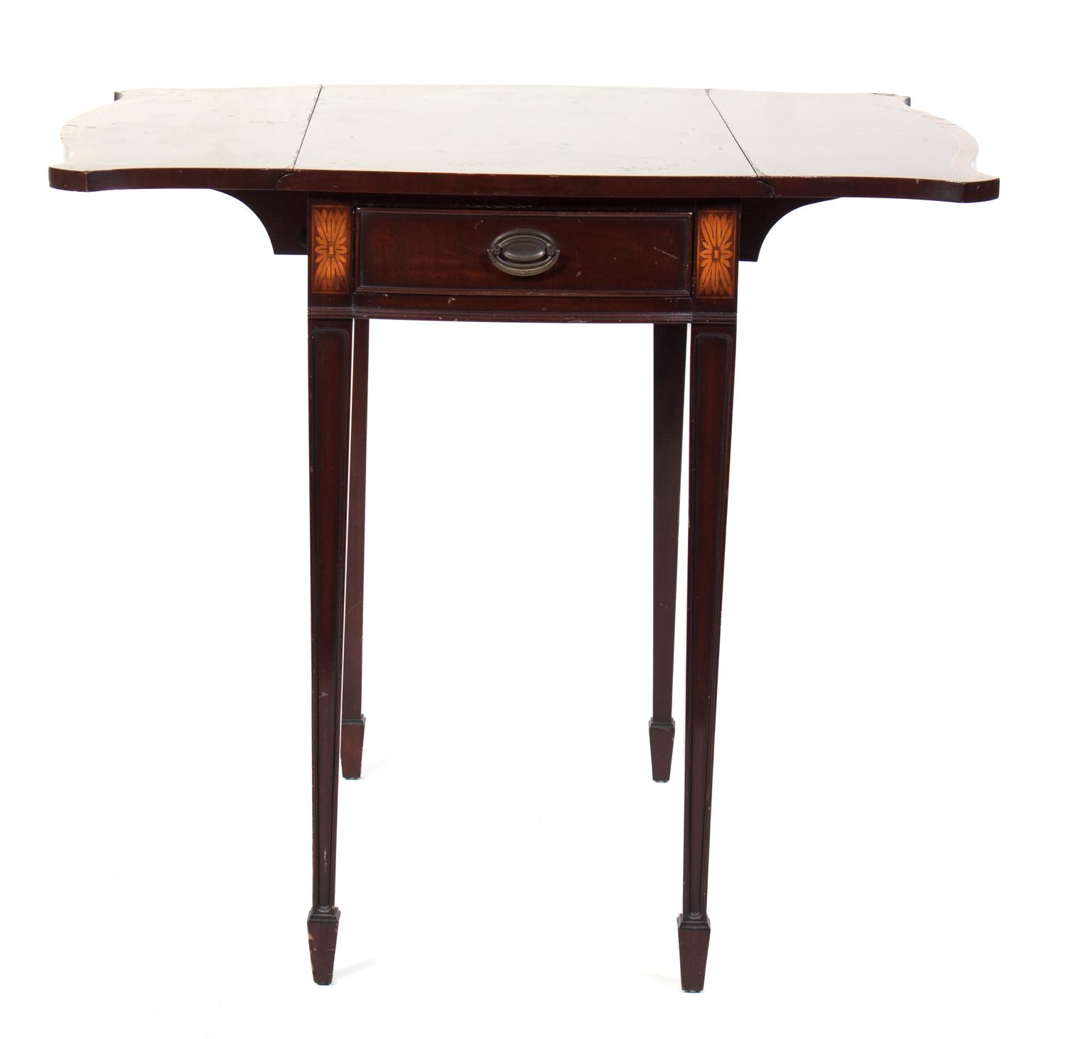 A Drop-Leaf Table Height 28 1/4 inches.