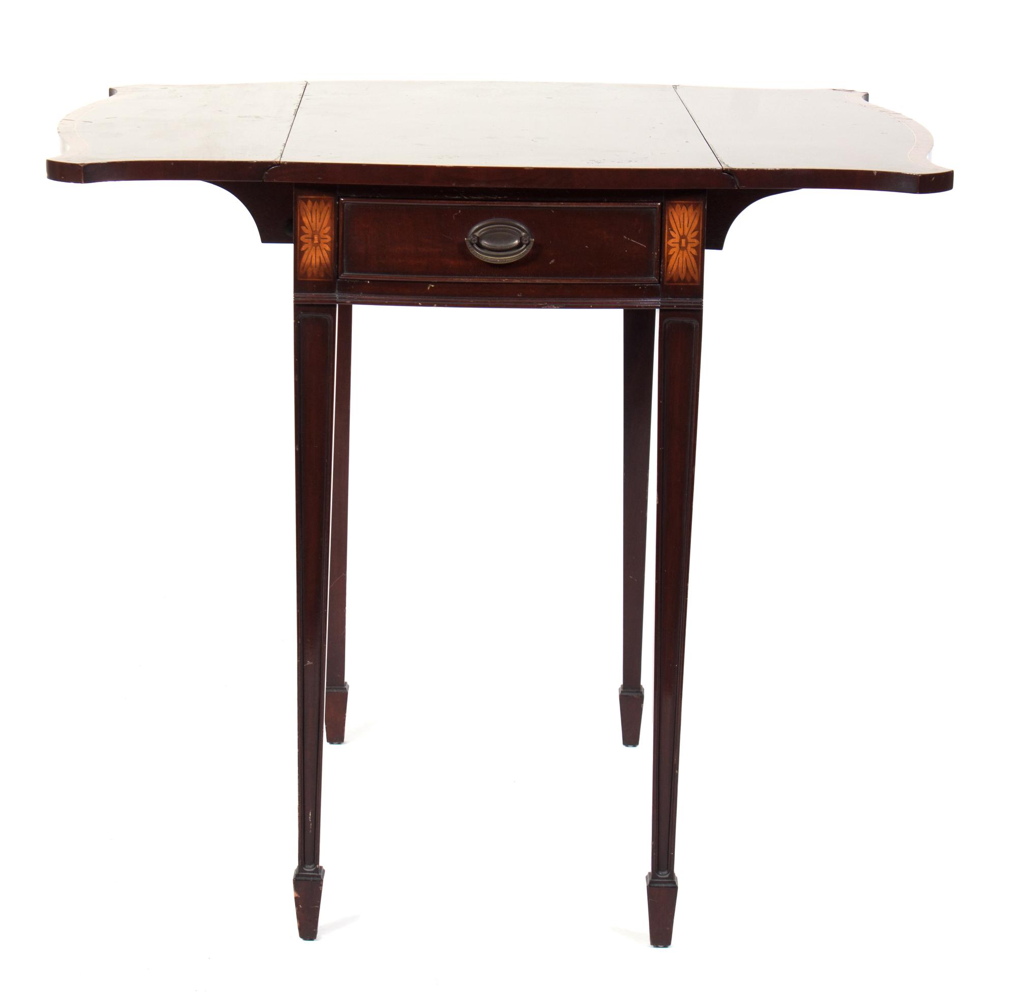 A Drop-Leaf Table Height 28 1/4 inches.