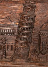 A Continental Carved Oak Lift-Top Trunk