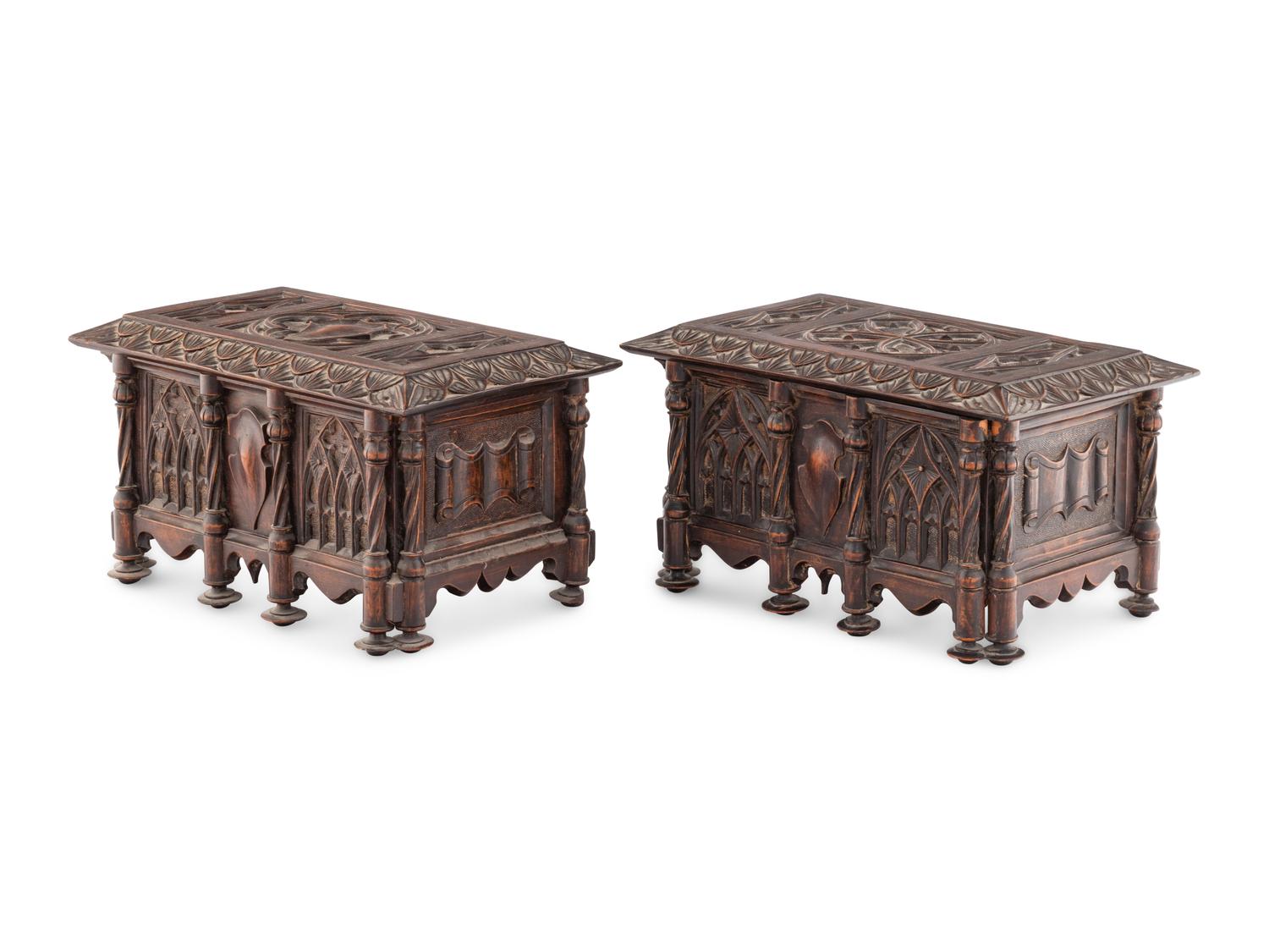 A Pair of Gothic Revival Carved Oak Table Caskets
