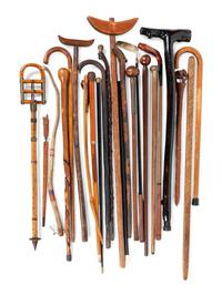 A Large Collection of Carved Canes and Walking Sticks