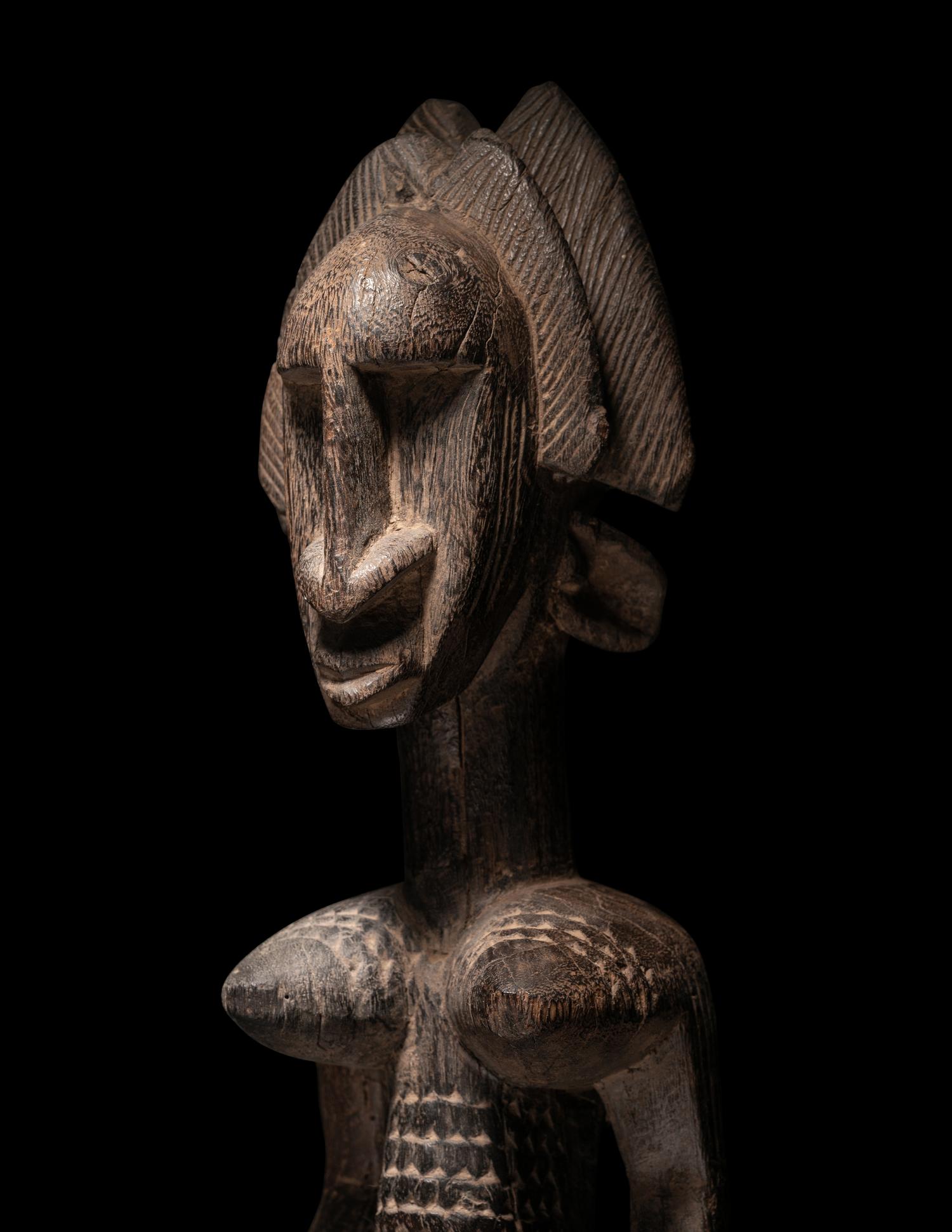 An African Carved Wood Figure
