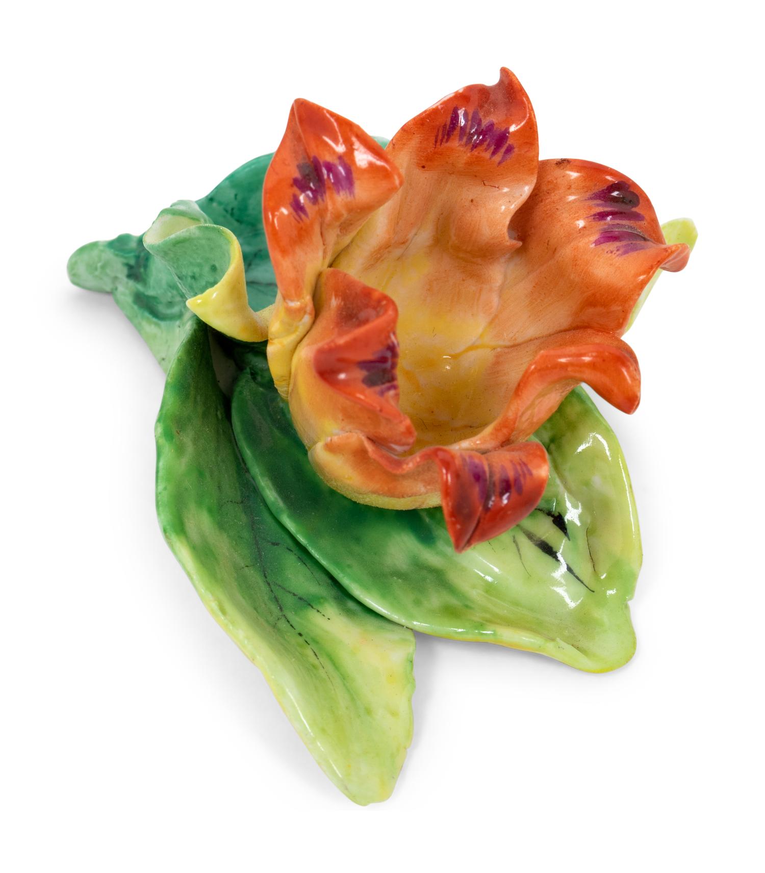 A Group of Nine Porcelain Flowers